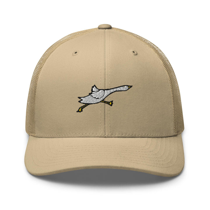 a baseball cap with a bird embroidered on the front