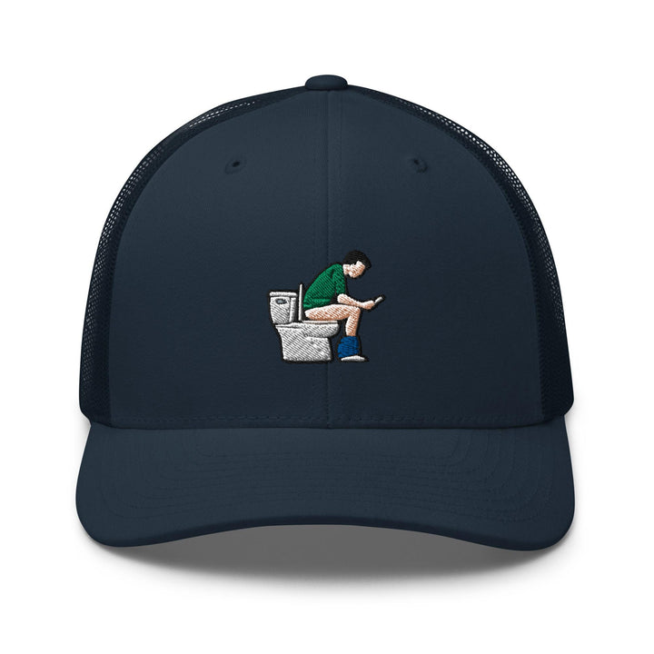 a blue hat with a man sitting on a toilet