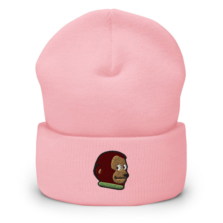 a pink beanie with a monkey on it