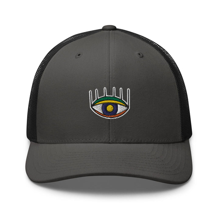 a gray and black trucker hat with an eye on it