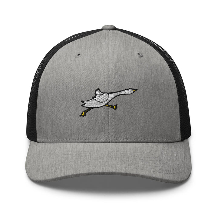 a gray and black trucker hat with a white bird on it