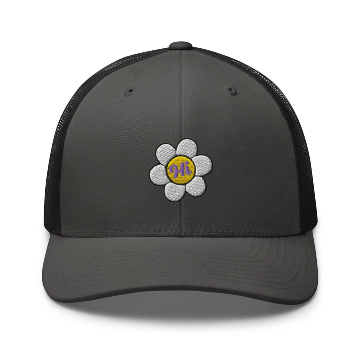 a gray and black trucker hat with a flower on the front