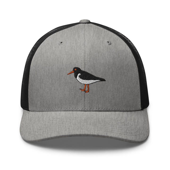 a gray and black hat with a bird embroidered on it