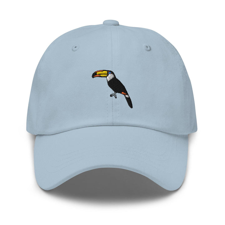 a light blue hat with a toucan on it