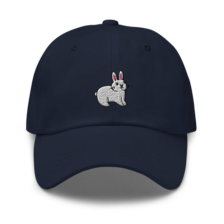 a blue hat with a white rabbit embroidered on it