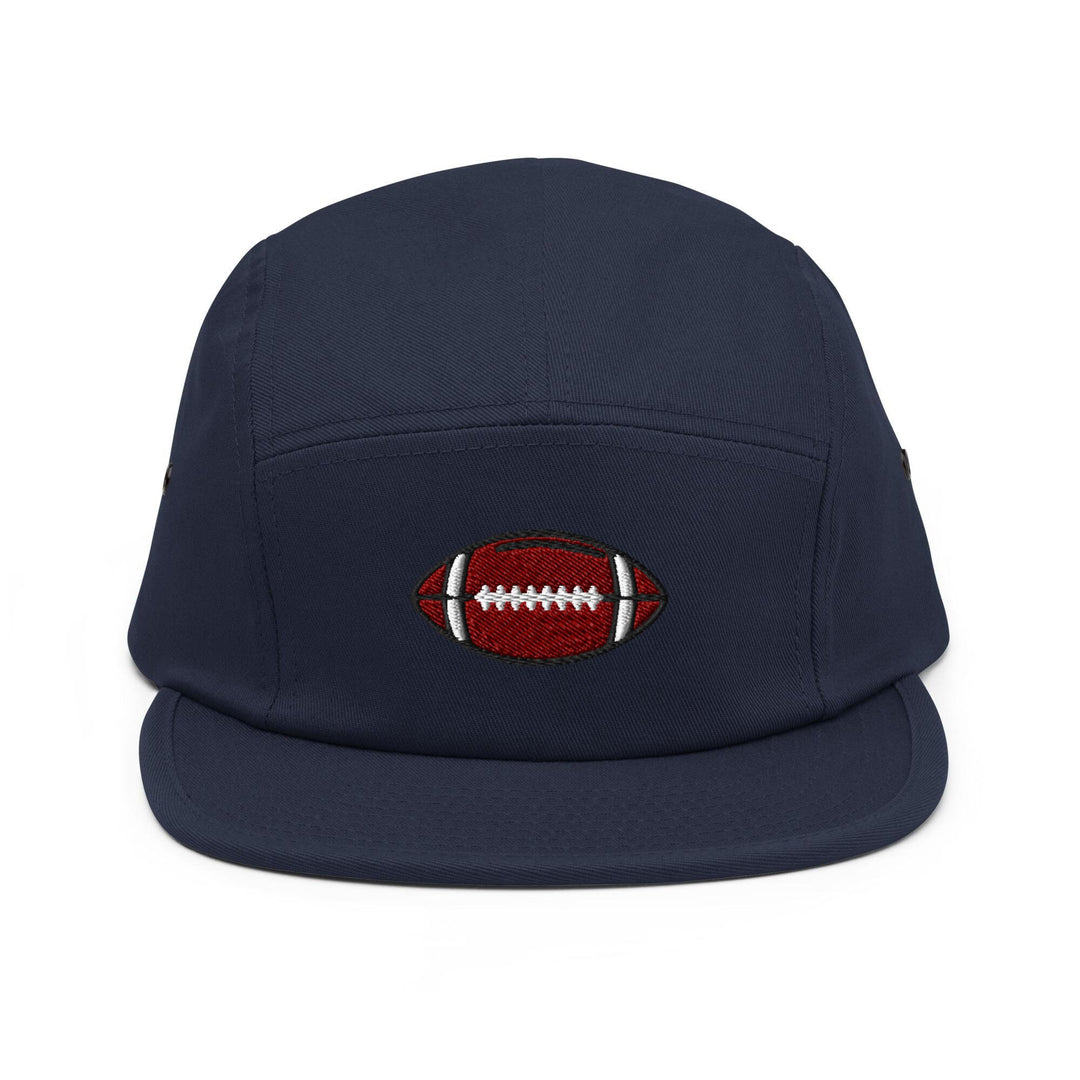 a blue hat with a football embroidered on it