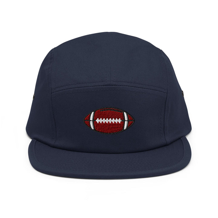a blue hat with a football embroidered on it