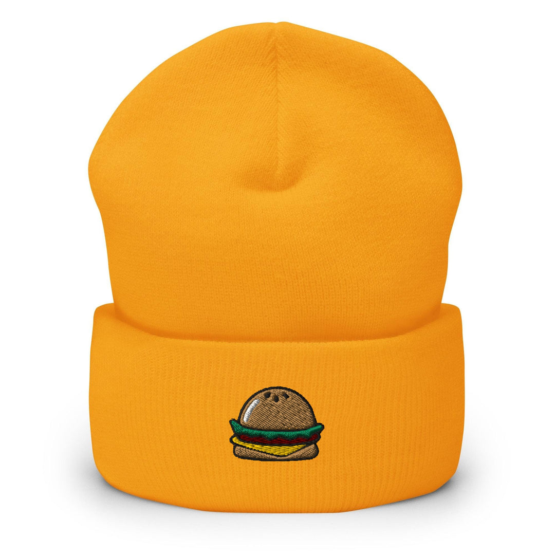 a yellow beanie with a burger embroidered on it