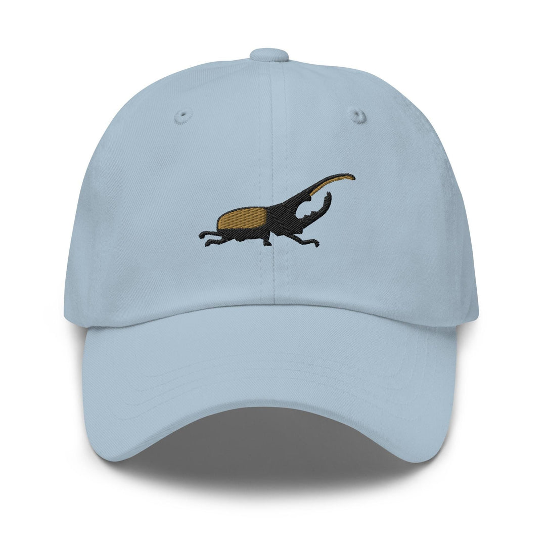 a light blue hat with an image of an antelope on it
