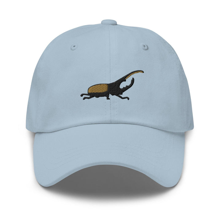 a light blue hat with an image of an antelope on it