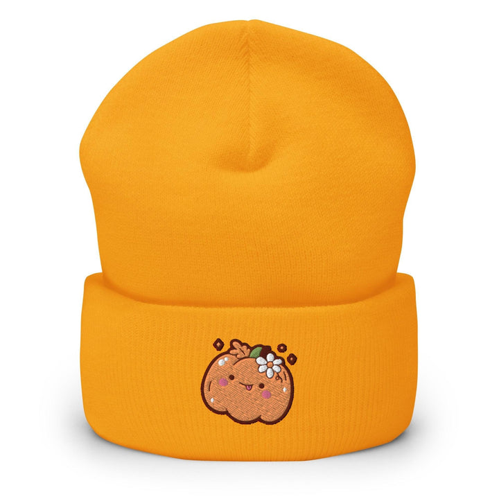 a yellow beanie with a picture of a donut on it
