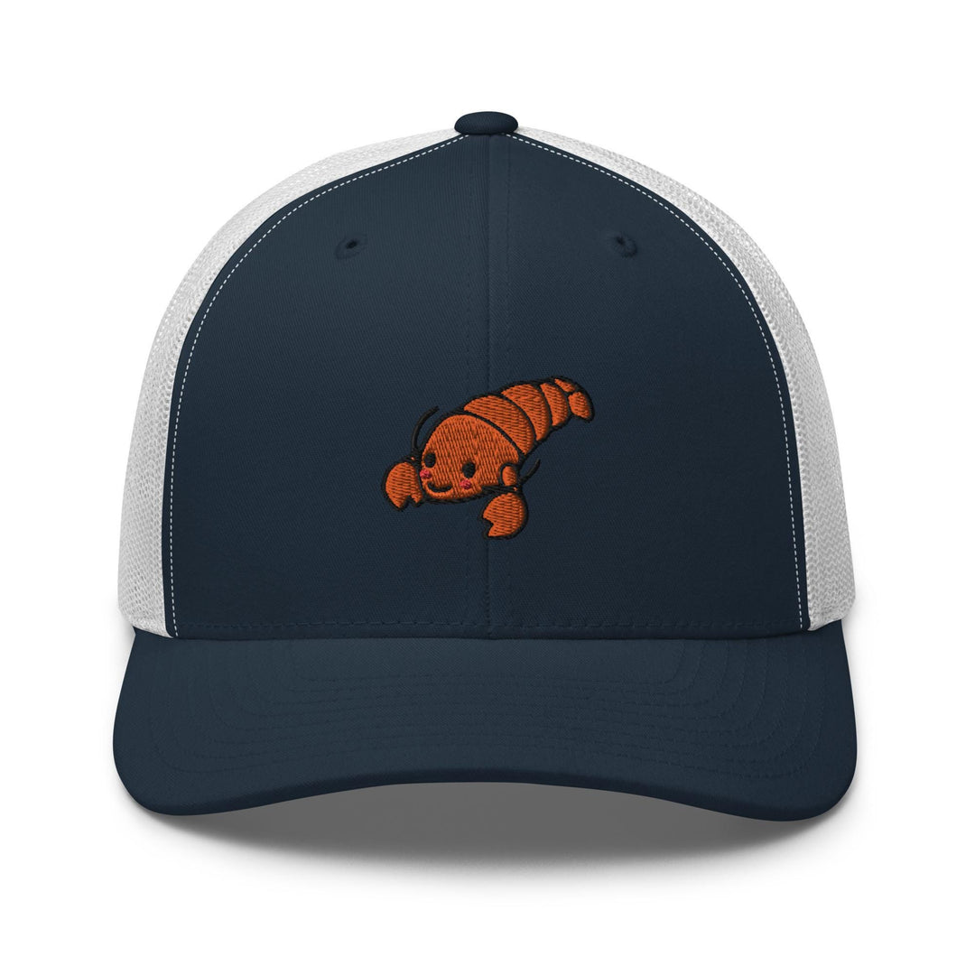 a blue and white trucker hat with an orange fish on it