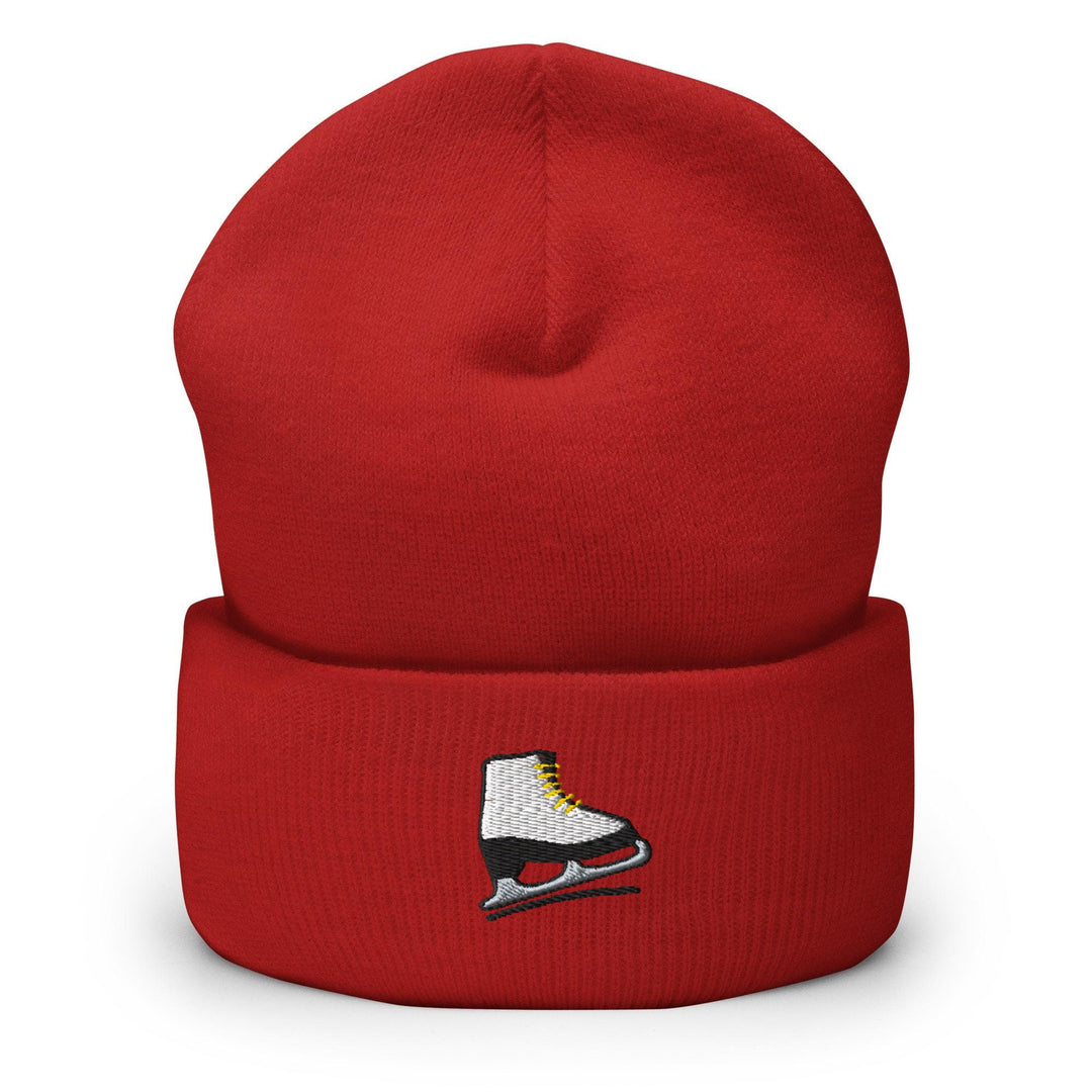 a red hat with a pair of ice skates on it