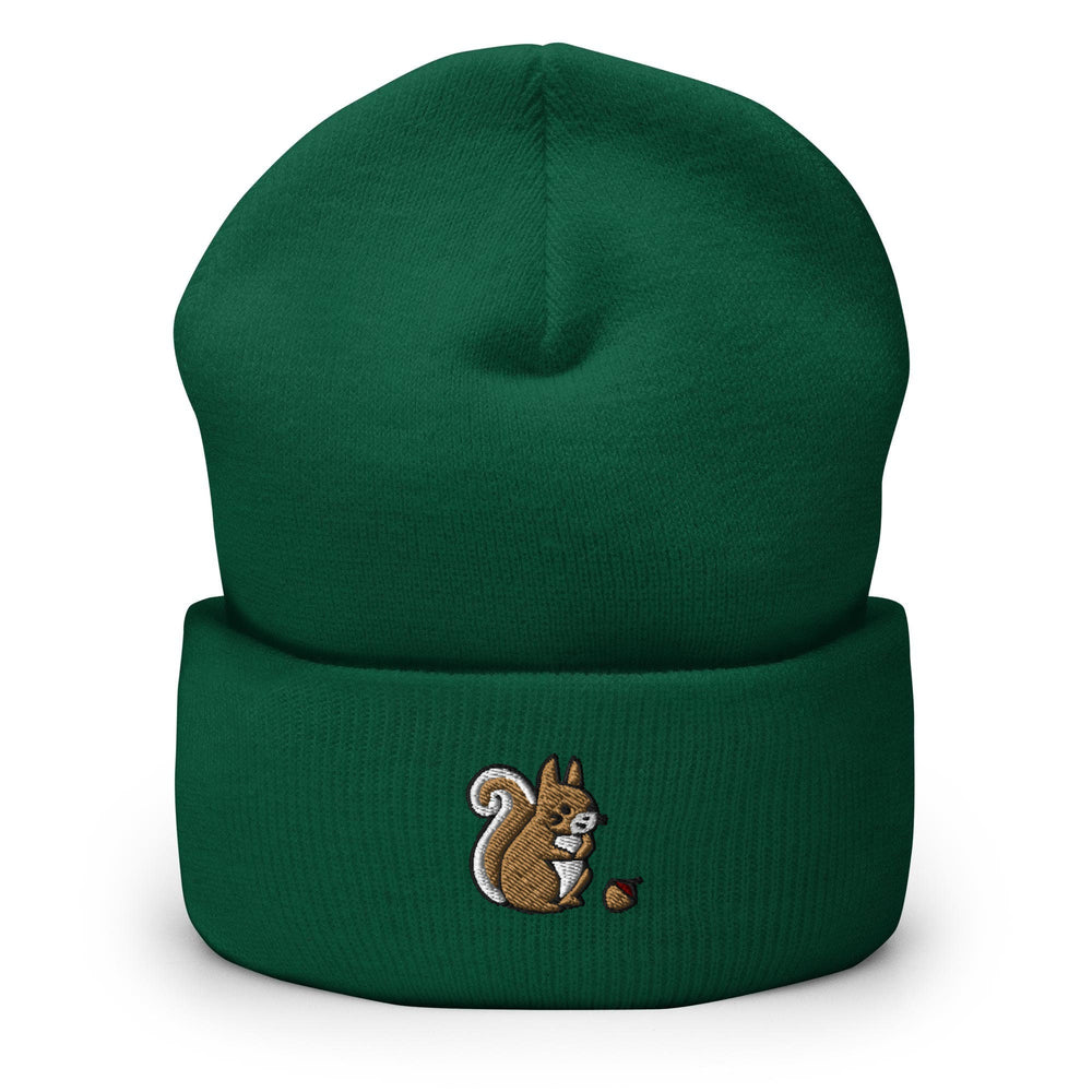 a green beanie with a squirrel on it