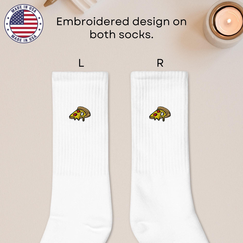 a pair of white socks with a picture of a turtle on it