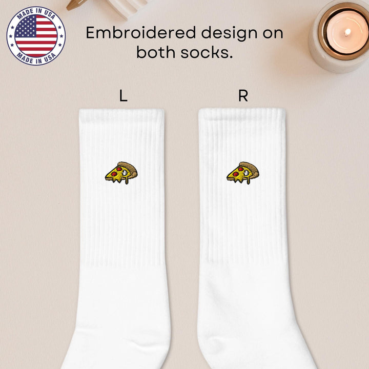 a pair of white socks with a picture of a turtle on it