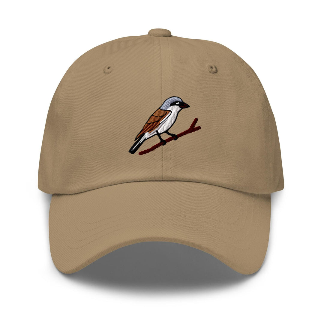 a tan hat with a bird embroidered on it