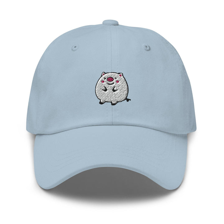 a light blue hat with a white dog embroidered on it