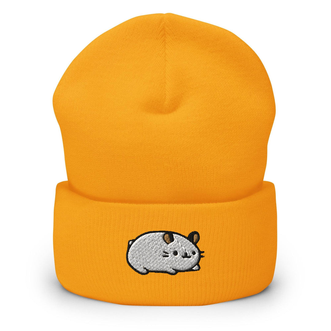 a yellow beanie with a cartoon character on it