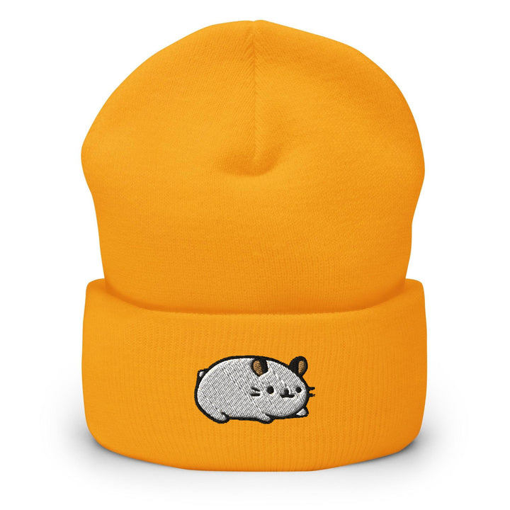a yellow beanie with a cartoon character on it