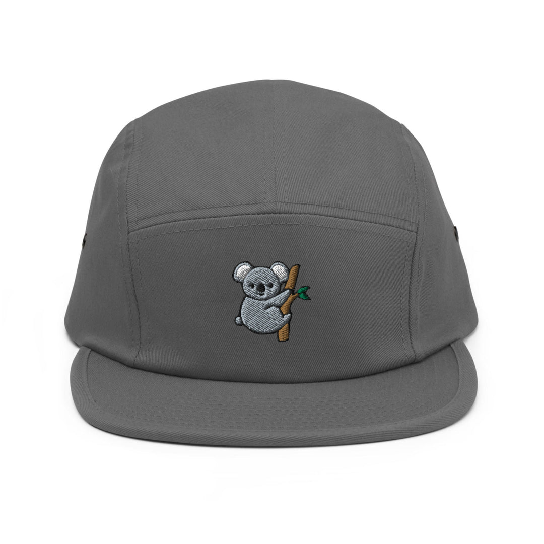 a grey hat with a koala bear on it
