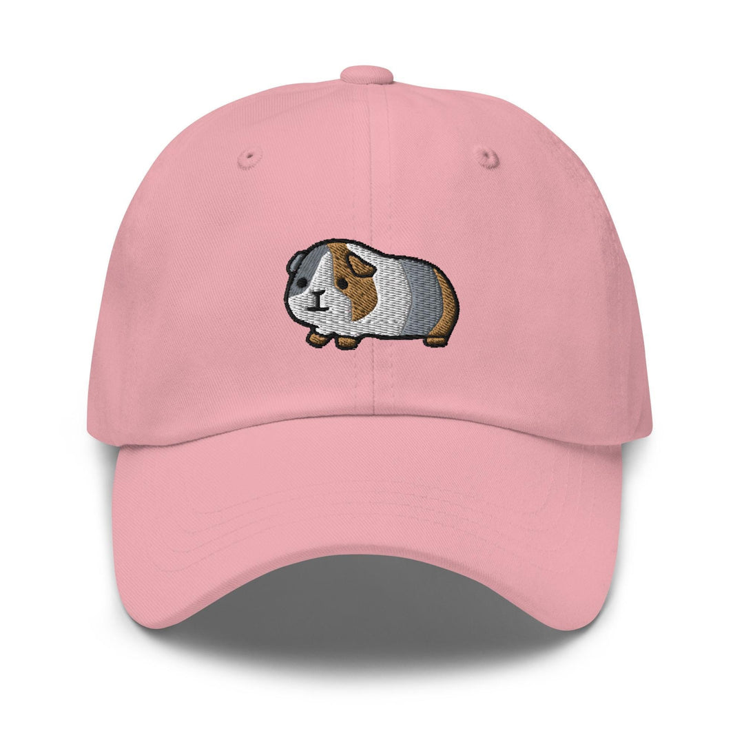 a pink cap with a guinea pig embroidered on it