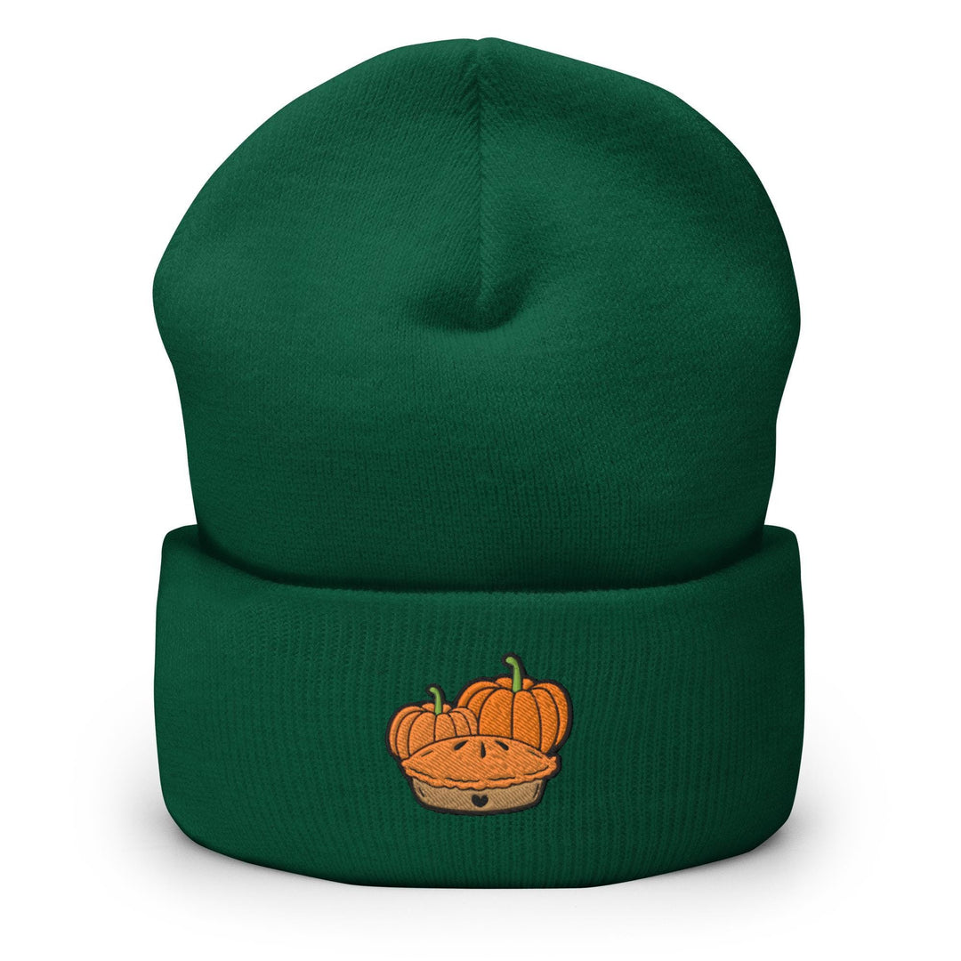 a green beanie with a picture of a pumpkin in a basket