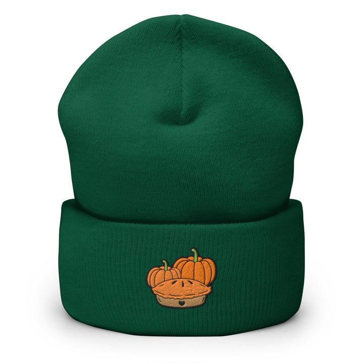 a green beanie with a picture of a pumpkin in a basket
