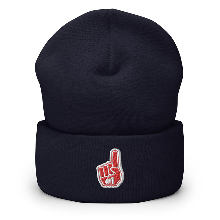 a navy beanie with a red and white peace sign on it