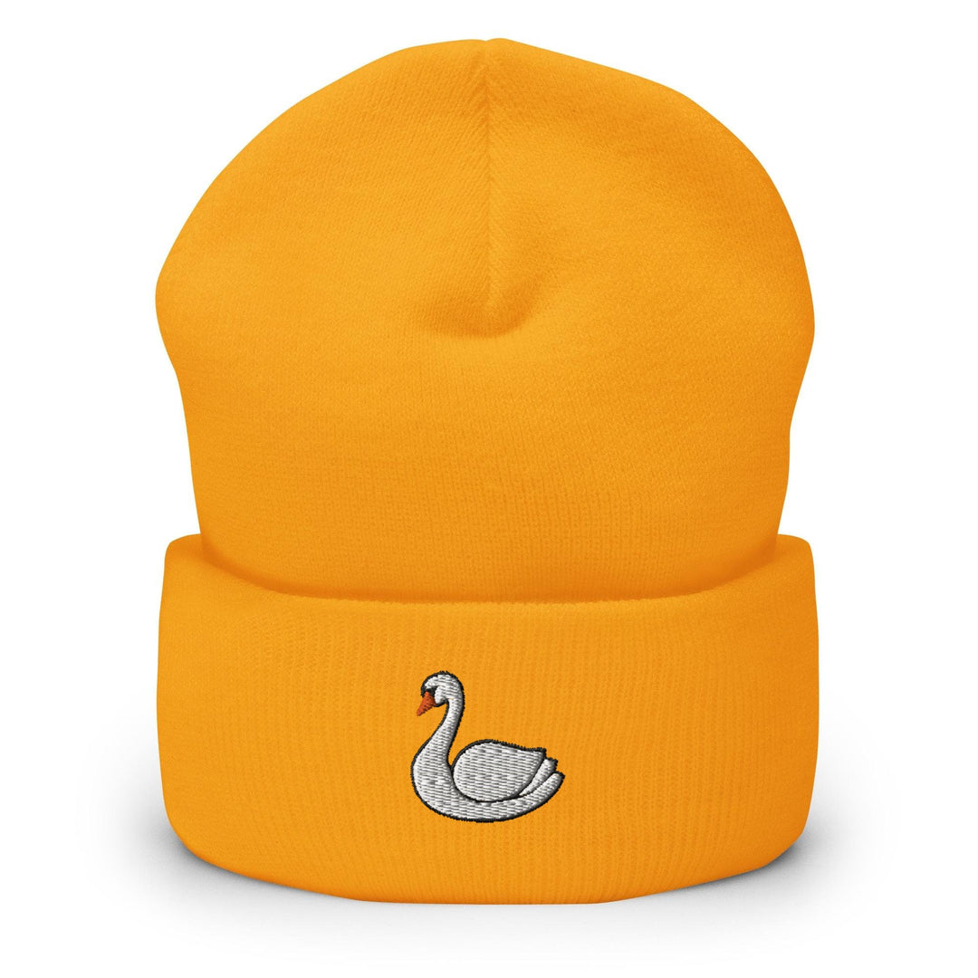 a yellow beanie with a white swan embroidered on it