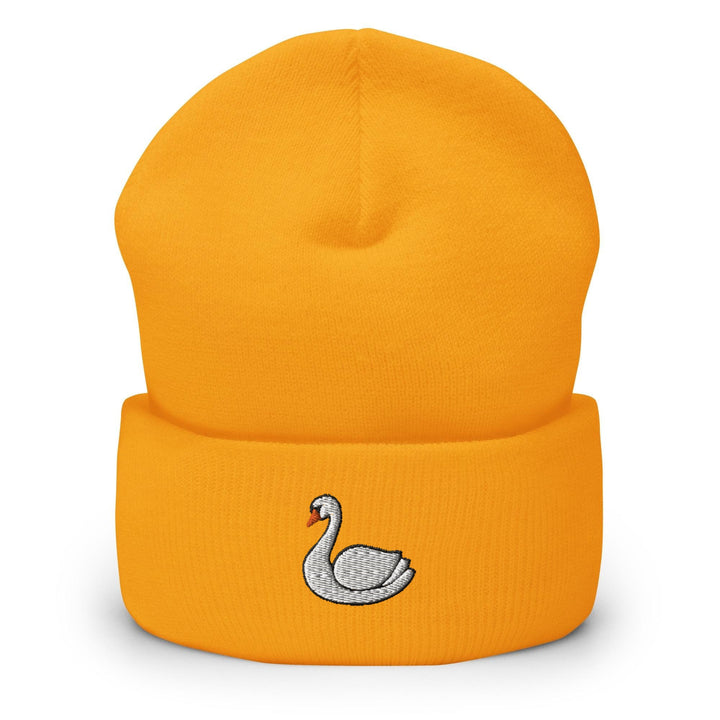 a yellow beanie with a white swan embroidered on it