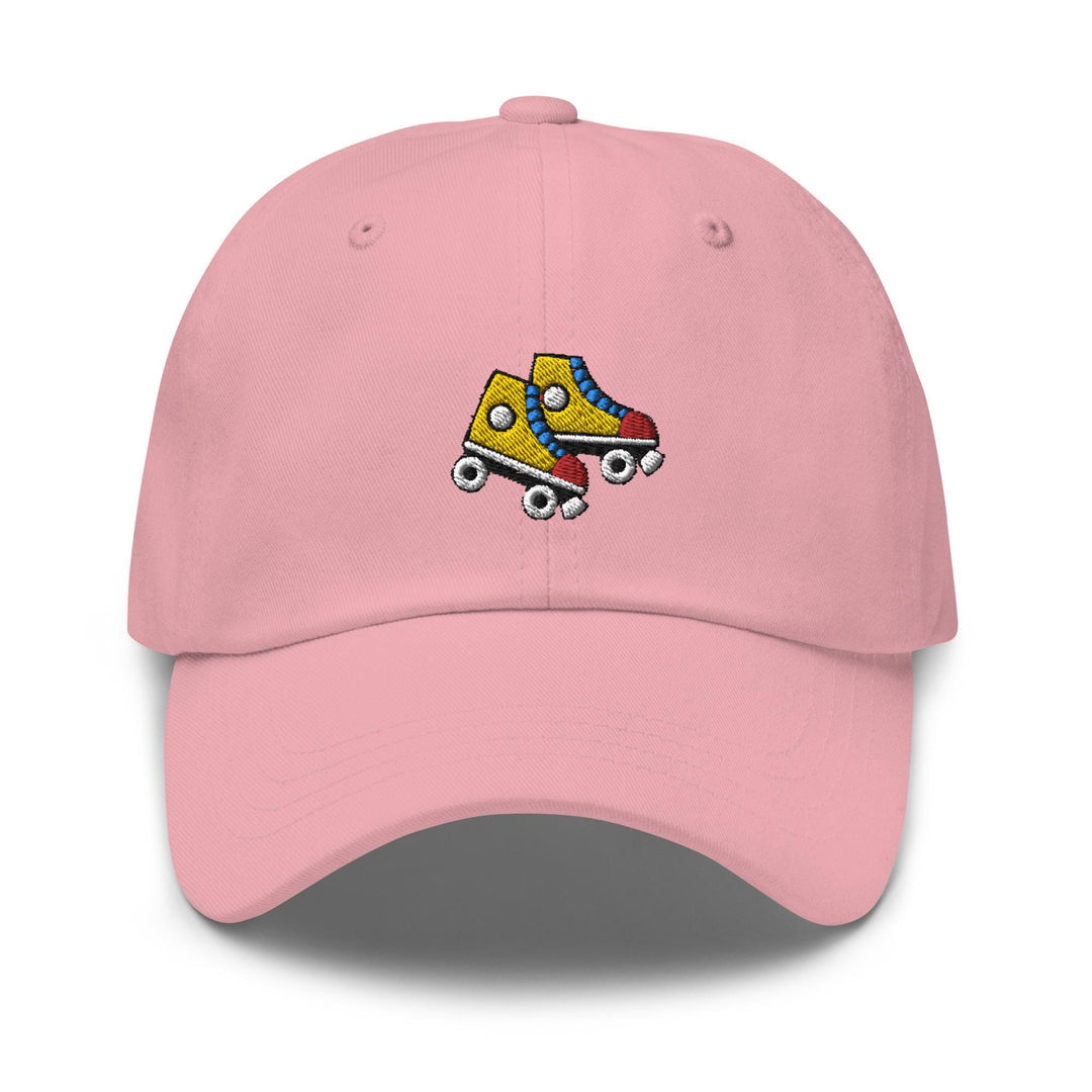 a pink hat with roller skates on it