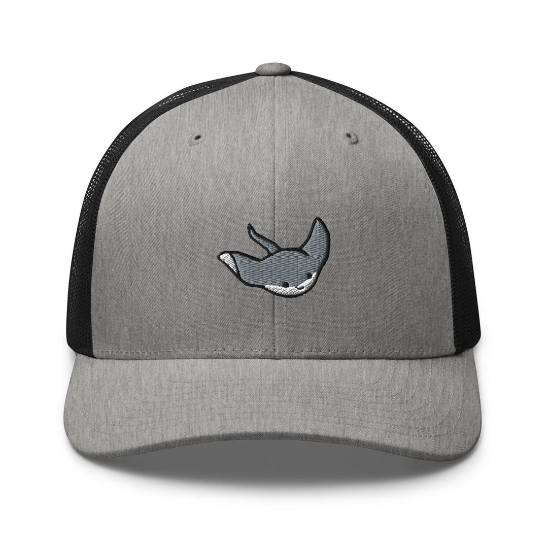 a gray and black trucker hat with a whale embroidered on the front