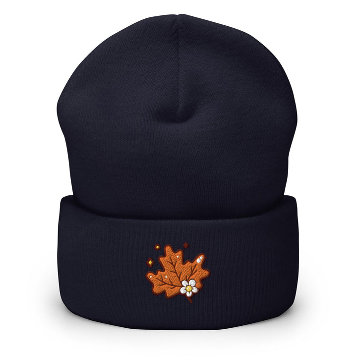 a beanie hat with a maple leaf embroidered on it