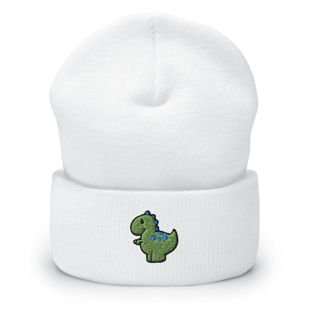 a white beanie with a green dinosaur embroidered on it