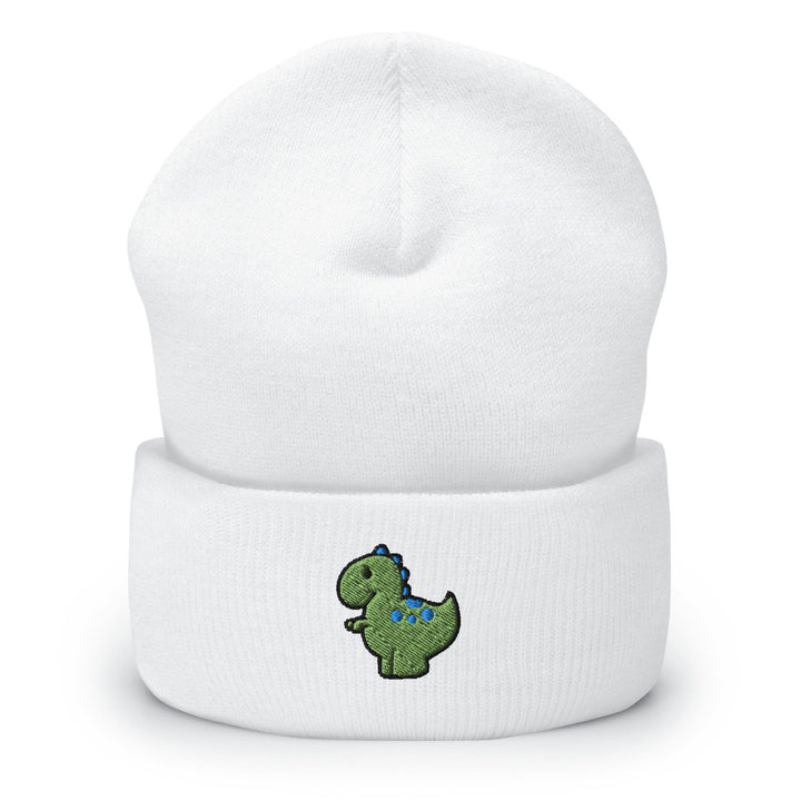 a white beanie with a green dinosaur embroidered on it