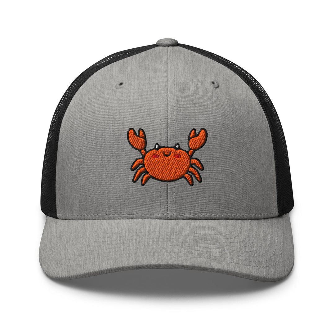 a gray and black trucker hat with a crab embroidered on the front