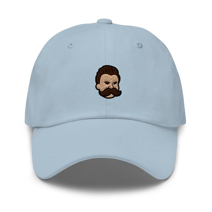 a light blue hat with a picture of a man with a beard
