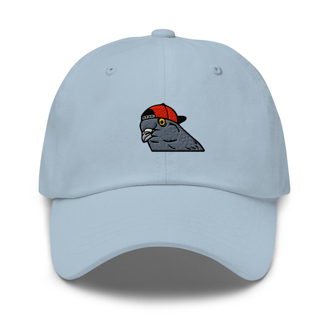 a light blue hat with a bird on it