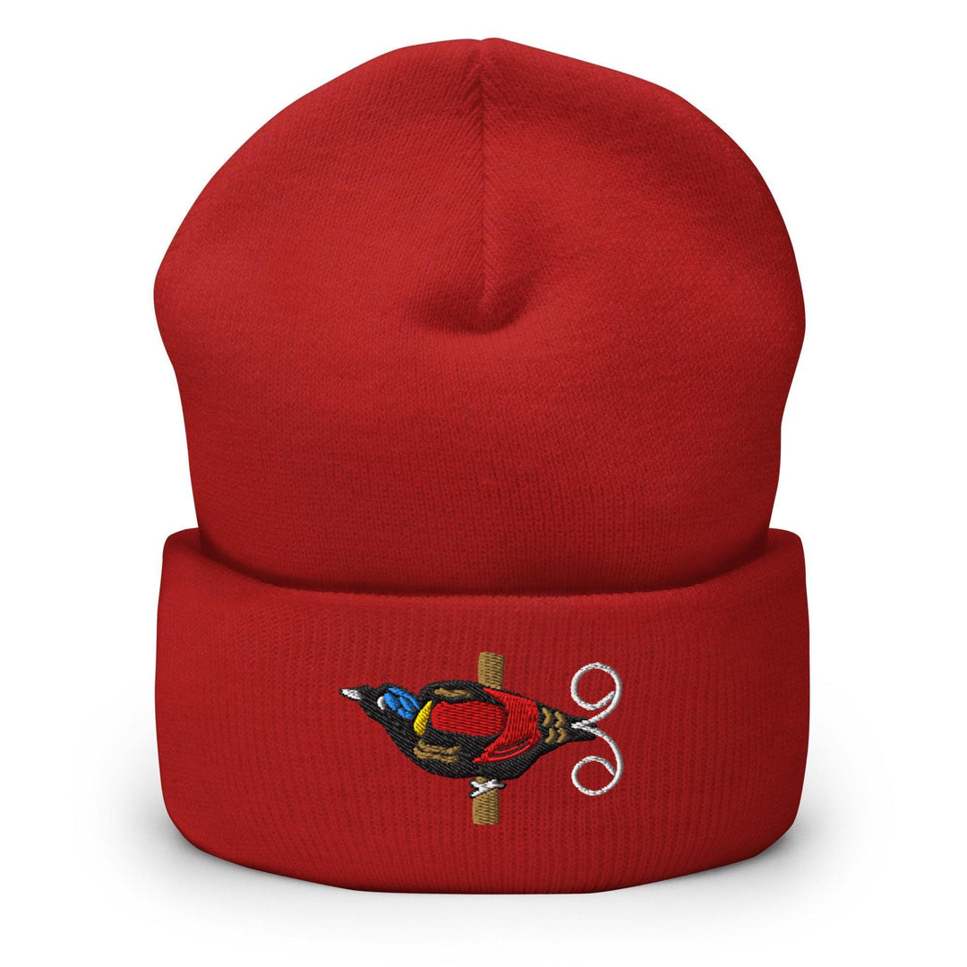 a red hat with a bird on it
