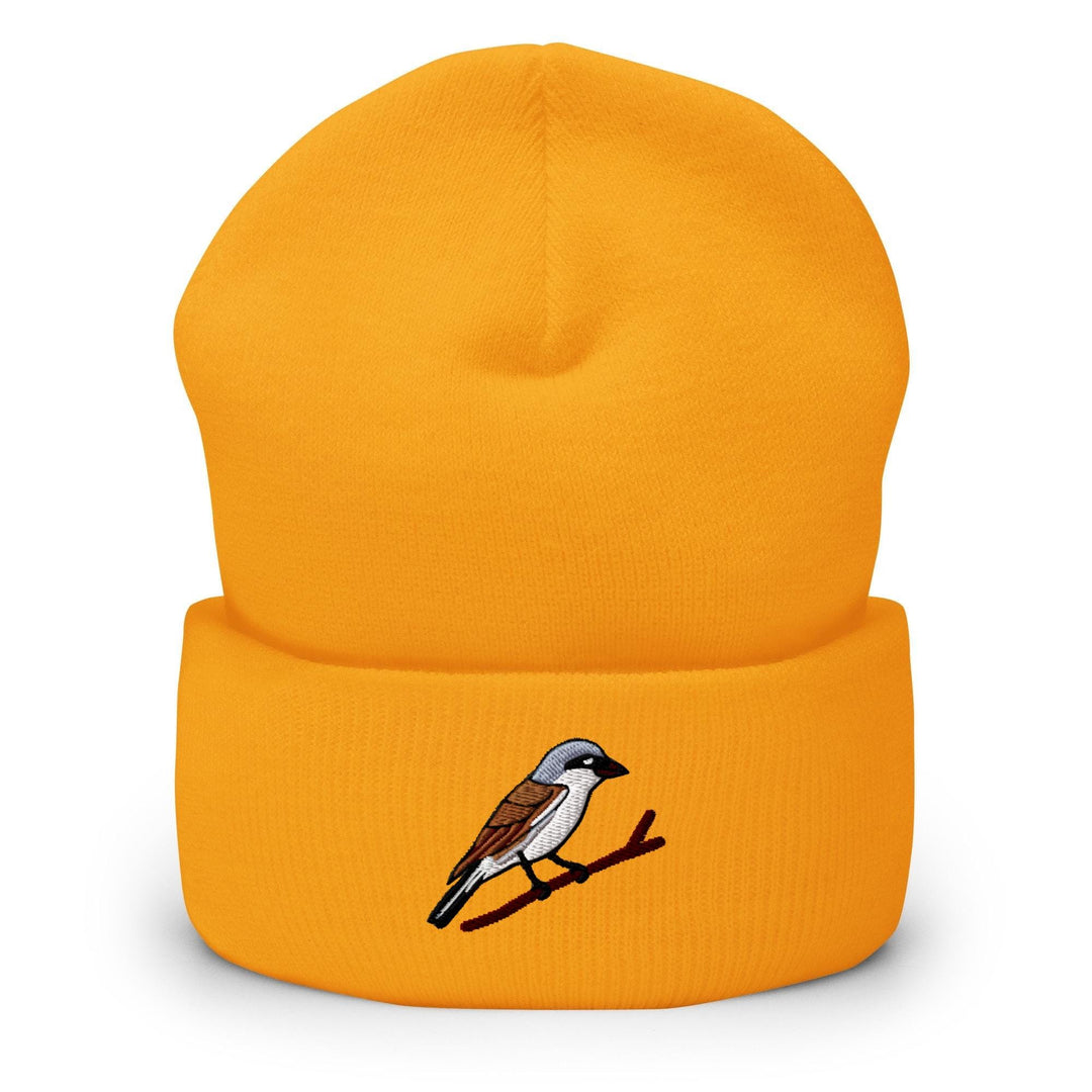 a yellow hat with a bird on it