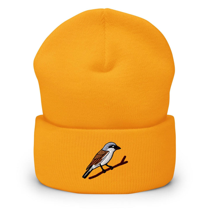 a yellow hat with a bird on it