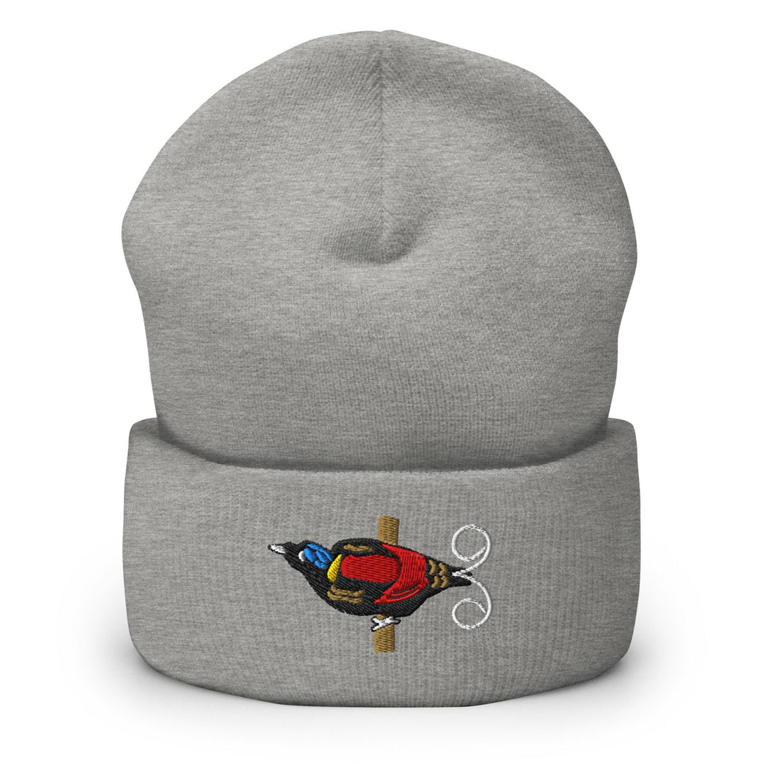 a grey beanie with a bird embroidered on it