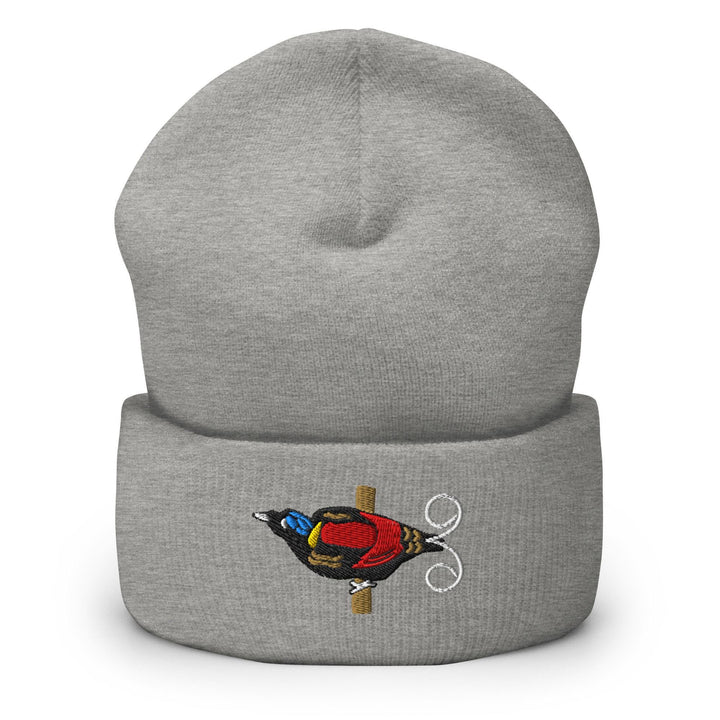 a grey beanie with a bird embroidered on it