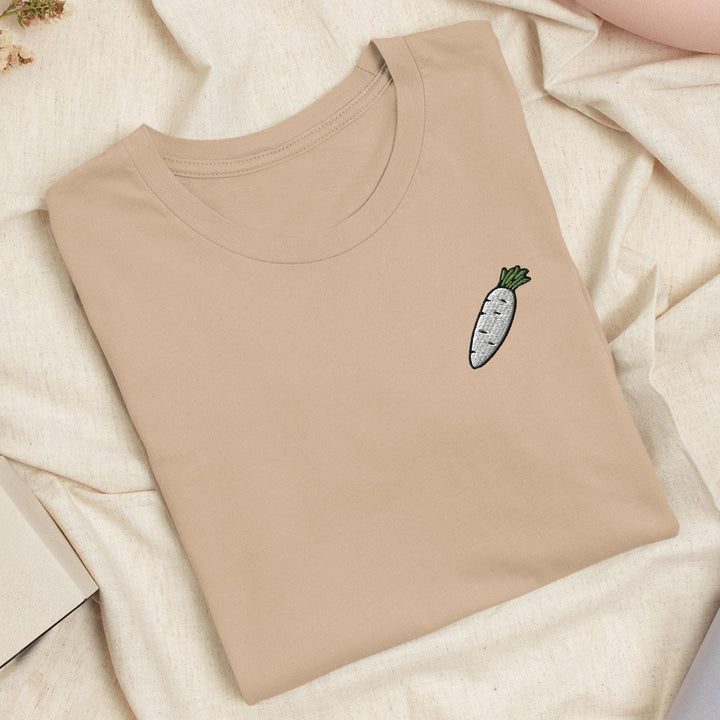 a t - shirt with a picture of a carrot on it