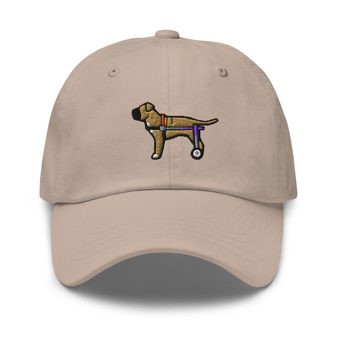a tan hat with a dog embroidered on it