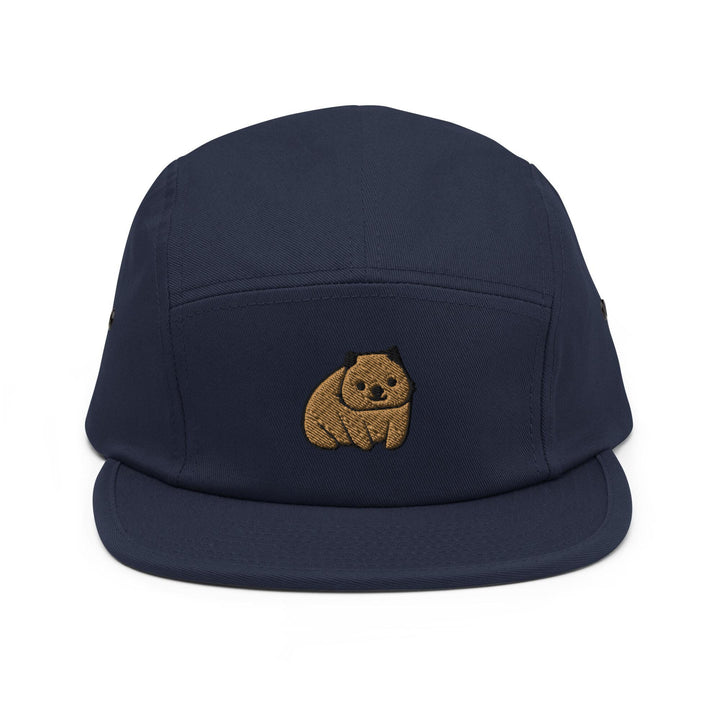 a blue hat with a brown bear embroidered on it
