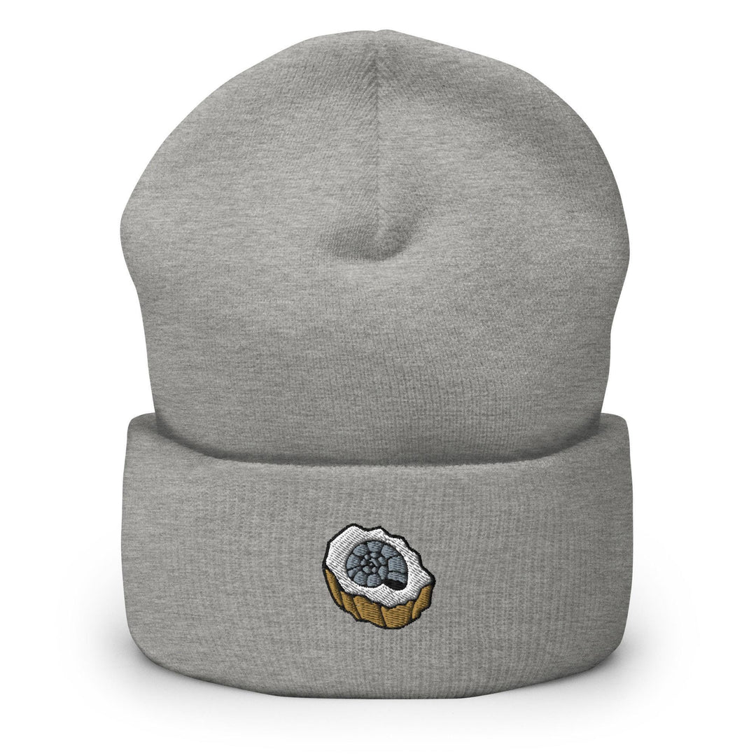a gray beanie with a blueberry on it