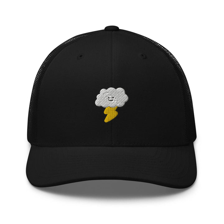 a black trucker hat with a white cloud and a banana on it