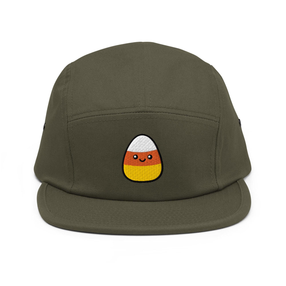 a green hat with an egg on it